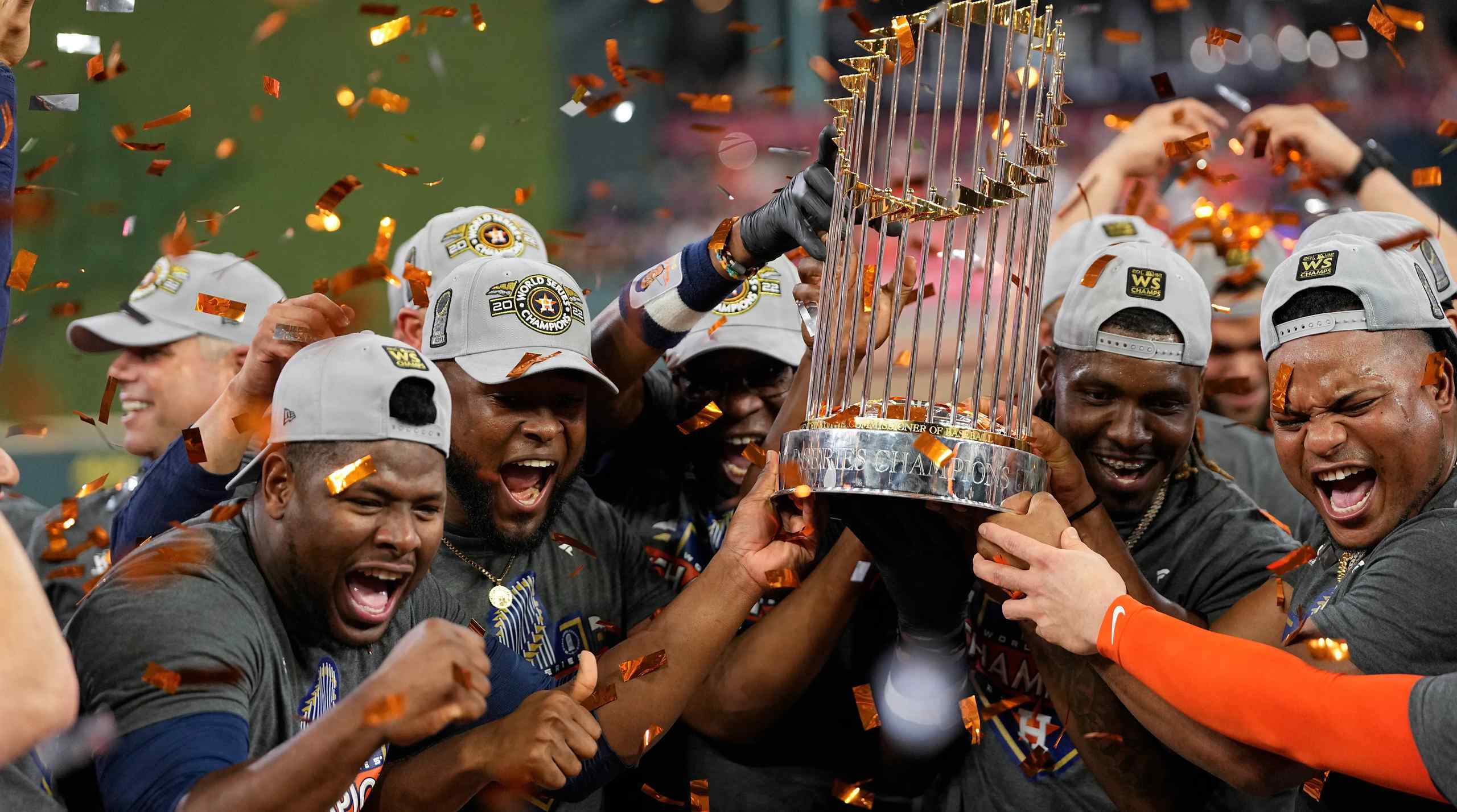 The Houston Astros celebrate with the Commissioner's Trophy after defeating the Philadelphia Phillies 4-1 in Game 6 of the 2022 World Series